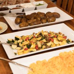 Baked potato bar, roasted veggies, and mac n cheese. Also swordfish with mango salad. Baked potato bar, roasted veggies, and mac n cheese. Also swordfish with mango salad.