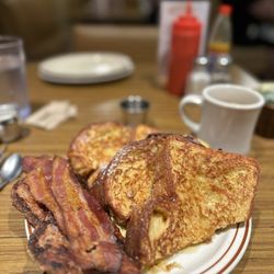 Clark Street Diner - Challah bread French Toast, Thick bacon (3pcs) and Breakfast Sausage (2pcs).