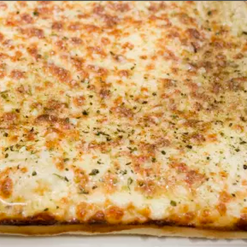Pizzaroni - Try our delectable italian cheesy bread sprinkled with Italian herbs $3.99 - Pizza Near Me - Bell Gardens, California Pizzaroni - Try our delectable italian cheesy bread sprinkled with Italian herbs $3.99 - Pizza Near Me - Bell Gardens, California