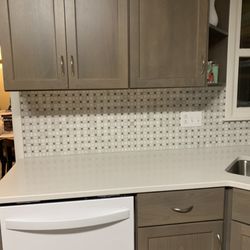 Floor & Decor - This marble mosaic backsplash is so dreamy with my budget quartz.