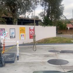 Shell - employee with noose on back of their car
