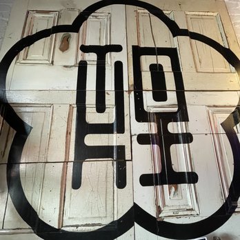 Toki Underground - Restaurant logo painted on vintage door - Ramen Near Me - Washington, DC, District of Columbia