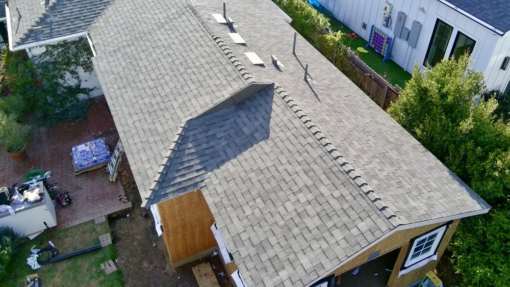 Slide of Economy Roofing