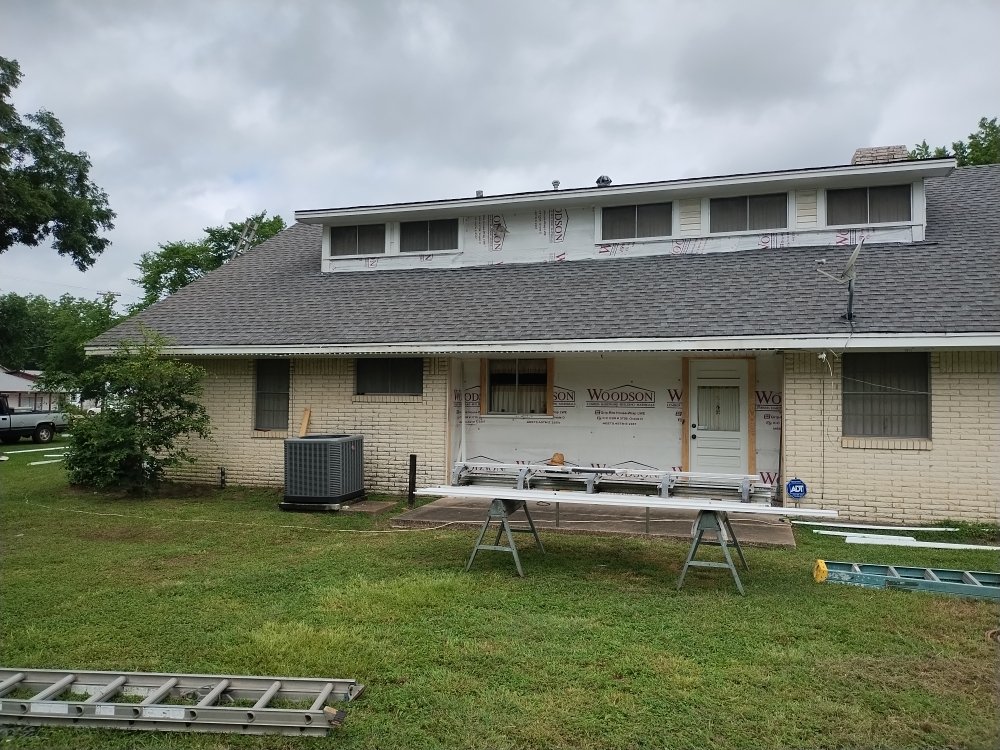 Slide of Estate Roofing