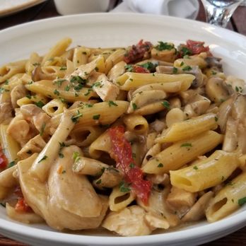 Spaghettini - Mild mushroom, chicken, and roasted garlic penne - Italian Near Me - Seal Beach, California Spaghettini - Mild mushroom, chicken, and roasted garlic penne - Italian Near Me - Seal Beach, California