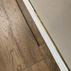 Haqq Renovations - Damaged base boards and loose floor panels