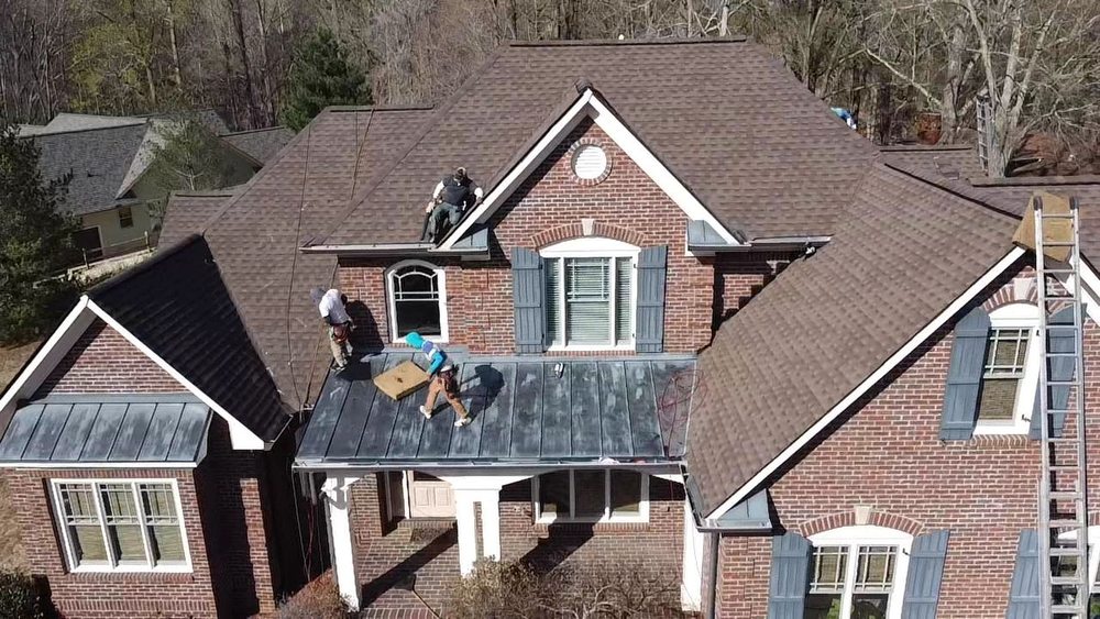 Slide of Demco Roofing & Restorations