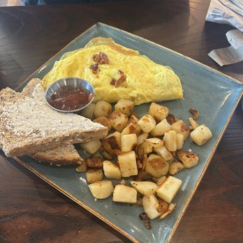 First Watch - Omelette with breakfast potatoes and toast - Breakfast & Brunch Near Me - Gainesville, Florida