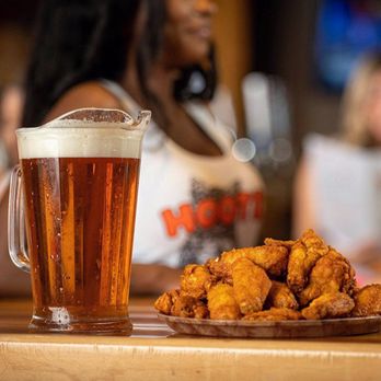 Hooters | Westminster - a plate of fried chicken and a glass of beer - American Near Me - Westminster, Colorado Hooters | Westminster - a plate of fried chicken and a glass of beer - American Near Me - Westminster, Colorado