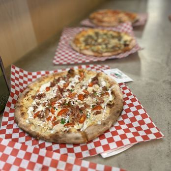 Cinders Wood Fired Pizza - three different types of pizza - Pizza Near Me - Redding, California Cinders Wood Fired Pizza - three different types of pizza - Pizza Near Me - Redding, California