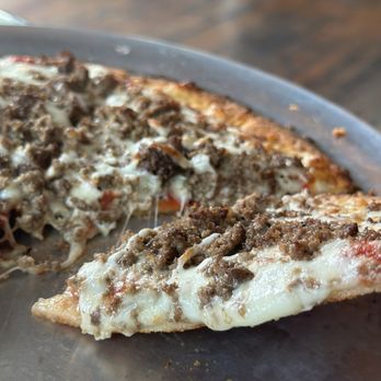 McClain's Pizzeria - Cauliflower GF crust with ground beef, mozzarella cheese and both red sauce and Alfredo sauce. - Pizza Near Me - Mandeville, Louisiana