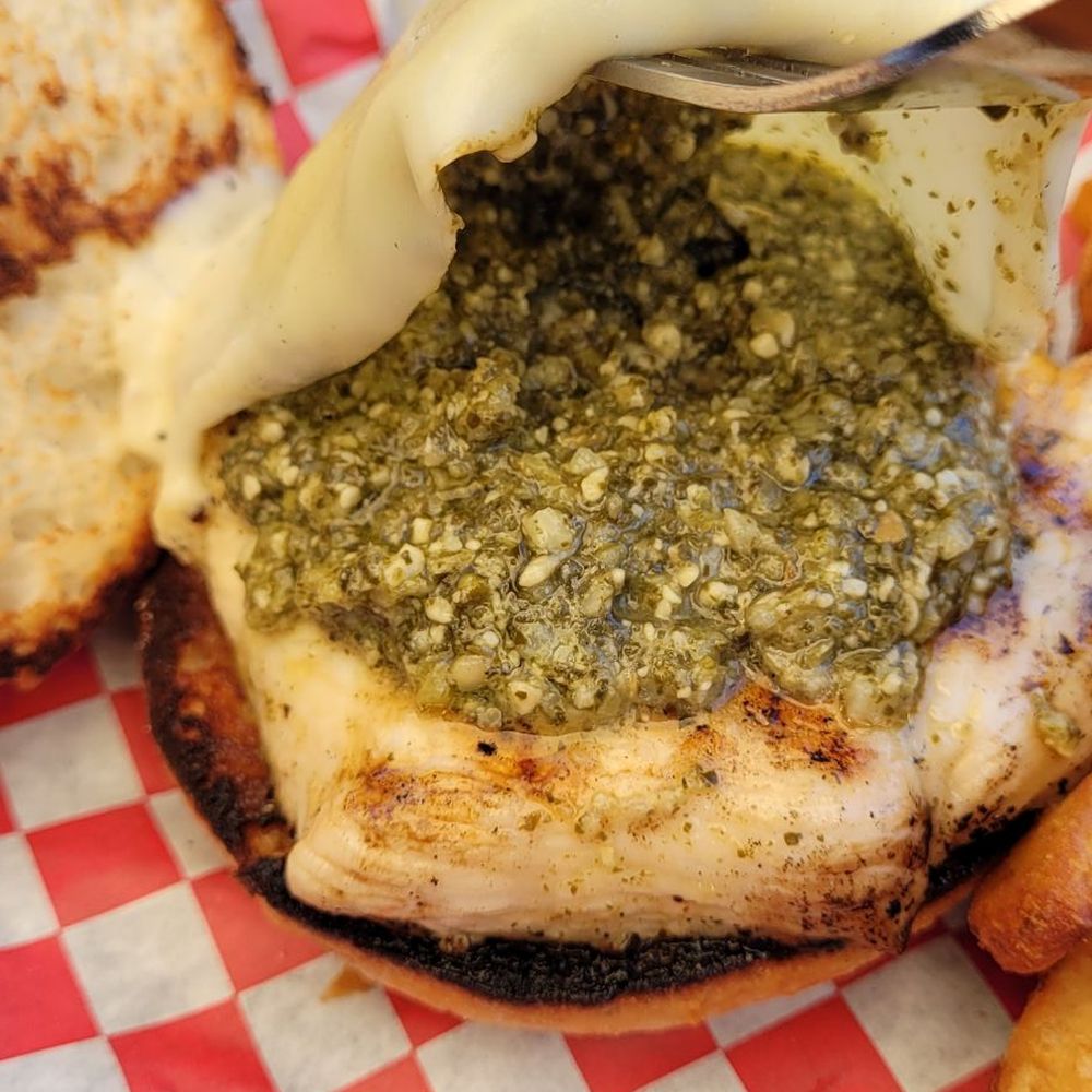 The Waterfront - Look at how much pesto you get. - New American Near Me - Menomonie, Wisconsin The Waterfront - Look at how much pesto you get. - New American Near Me - Menomonie, Wisconsin