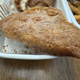 This is supposed to be battered fish and chip. More like cardboard dumped in the fryer. This is supposed to be battered fish and chip. More like cardboard dumped in the fryer.