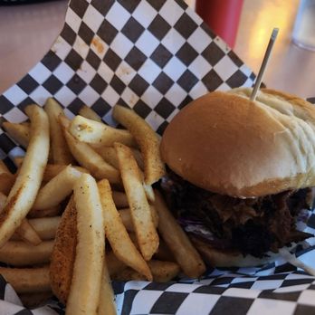 Wild Child - My pulled pork sandwich with a side of fries. A nice sized and tasty lunch! - Chicken Wings Near Me - Olympia, Washington Wild Child - My pulled pork sandwich with a side of fries. A nice sized and tasty lunch! - Chicken Wings Near Me - Olympia, Washington