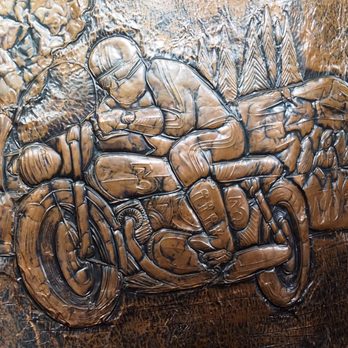 Corelli's Cafe - Detail of copper panel on bar - Cafes Near Me - Auckland, AUK Corelli's Cafe - Detail of copper panel on bar - Cafes Near Me - Auckland, AUK