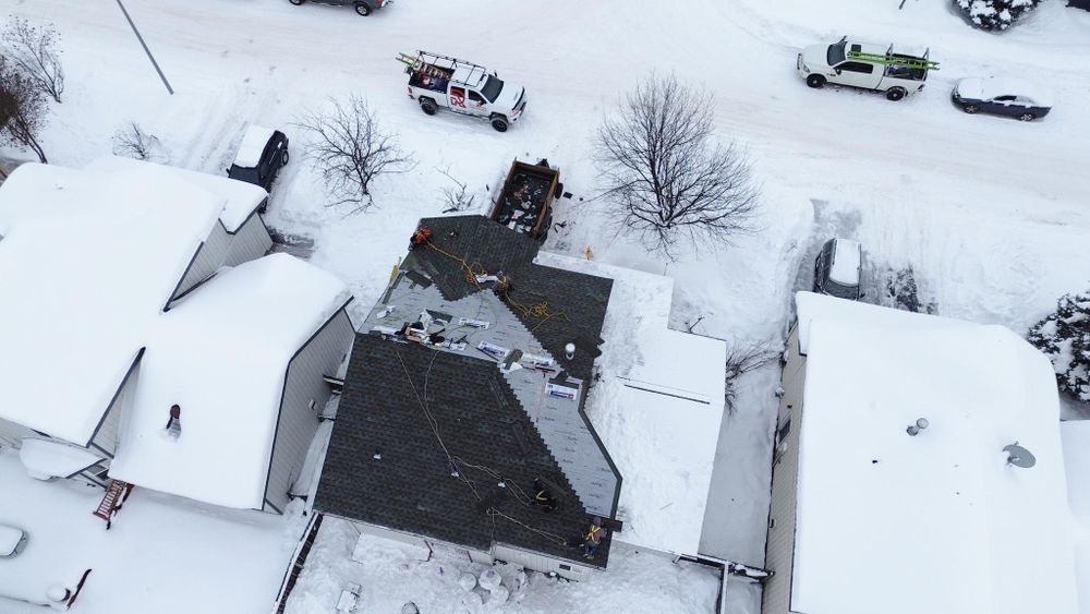 Slide of Reds Roofing & Renovations