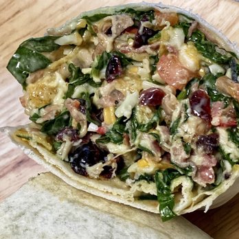Pie-O-Mine Greens - ows a close up of a burrito - Salad Near Me - Orchard Park, New York Pie-O-Mine Greens - ows a close up of a burrito - Salad Near Me - Orchard Park, New York