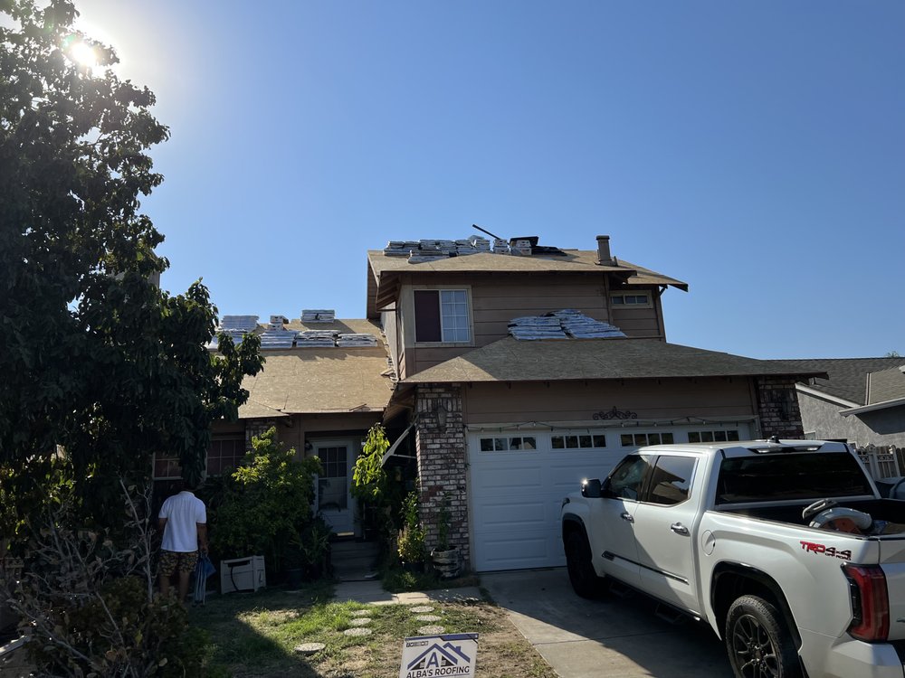 Slide of Albas Roofing