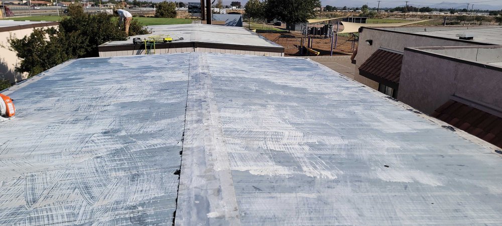 Slide of Do It All Roofing