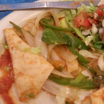 Taco and Tequila Mexican Restaurant - This is the fajitas style burrito. 80% onions. No mushrooms ? And they charge $8.50 for this onion burrito.... Not a good deal ! - Mexican Near Me - Lincolnton, North Carolina