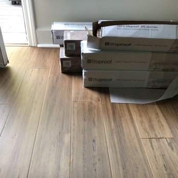 JM Floors - a stack of boxes on the floor - Flooring Near Me - Lawrenceville, Georgia JM Floors - a stack of boxes on the floor - Flooring Near Me - Lawrenceville, Georgia