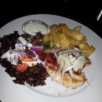 Granny Mac's - Grilled chicken with bacon cheese and ceasar dressing, chips and salat - Irish Pub Near Me - Erlangen, BY Granny Mac's - Grilled chicken with bacon cheese and ceasar dressing, chips and salat - Irish Pub Near Me - Erlangen, BY