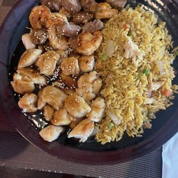 steak, shrimp, and chicken fried rice