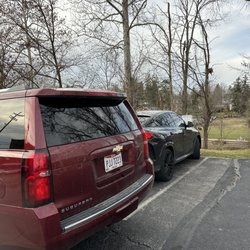 Chuck's Fine Wines - Owner blocking in PAYING customers.