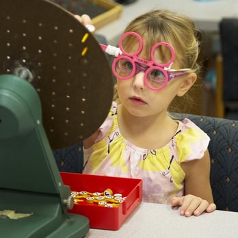 Accent Eye Care - Pegboard rotation to improve tracking and accuracy of aiming. - Optometrists Near Me - Phoenix, Arizona Accent Eye Care - Pegboard rotation to improve tracking and accuracy of aiming. - Optometrists Near Me - Phoenix, Arizona