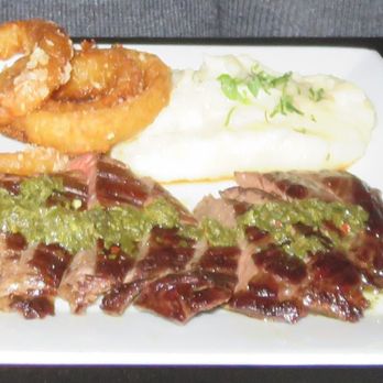 Charlies Bar & Kitchen - Skirt steak, mash potatoes, onion rings - Cocktail Bars Near Me - Bronx, New York
