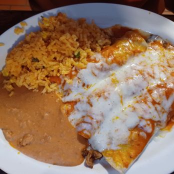 El Rancherito - Ground beef enchilada (3) plate with rice & refried beans, $12.50. - Mexican Near Me - Houston, Texas