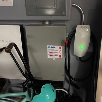 Artisan Electrical & HVAC - Tesla wall charger with 18ft cable I believe. - Electricians Near Me - Tracy, California