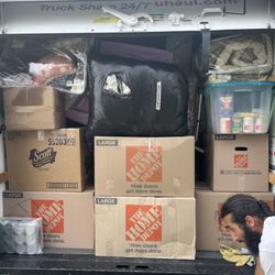We All We Got Express Services - Workers packing uhaul truck