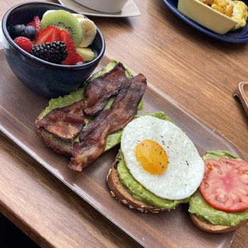 Eight AM - Avocado toast with fruit and a side of potatoes. - New American Near Me - San Francisco, California Eight AM - Avocado toast with fruit and a side of potatoes. - New American Near Me - San Francisco, California