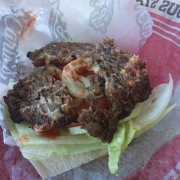 This is the crappy burger I got from Carl's. For all I know they picked it up off the floor... This is the crappy burger I got from Carl's. For all I know they picked it up off the floor...