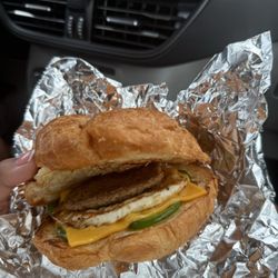 Sunny Shore Up - Breakfast sandwich on a croissant, very small turkey sausage, cheese n egg and jalapeño