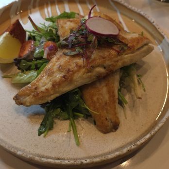 Mia Restaurant & Bar - Lightly pan seared seared bass filets on a bed of greens. - Italian Near Me - Roseville, California