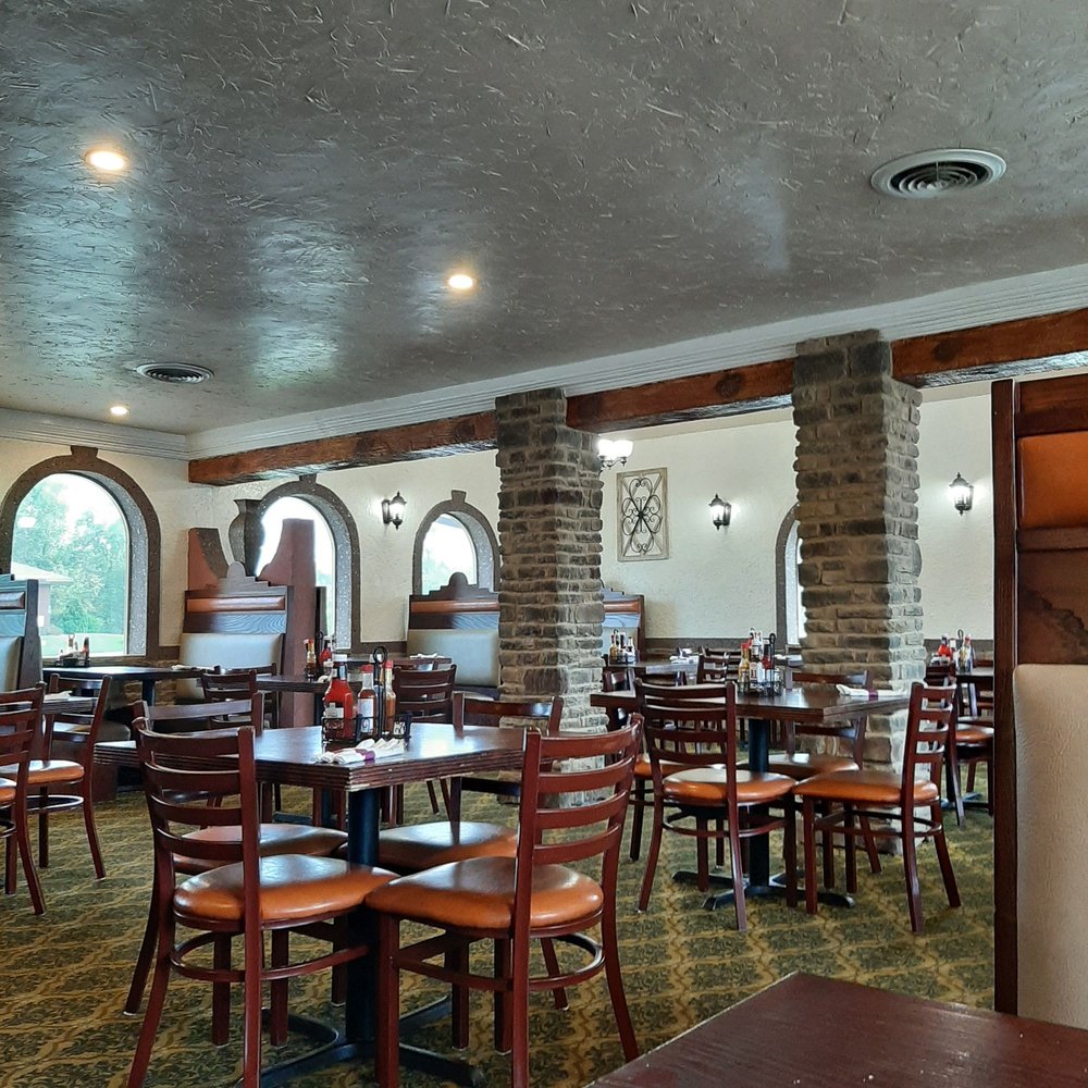 Plaza Mexico - tables and chairs in a restaurant - Mexican Near Me - Charles City, Iowa Plaza Mexico - tables and chairs in a restaurant - Mexican Near Me - Charles City, Iowa