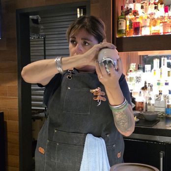 Sky & Vine Rooftop Bar - Gracie mixing drinks - New American Near Me - Napa, California
