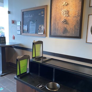 Starbucks - a coffee shop with a blackboard on the wall - Coffee & Tea Near Me - Rochester, New York Starbucks - a coffee shop with a blackboard on the wall - Coffee & Tea Near Me - Rochester, New York