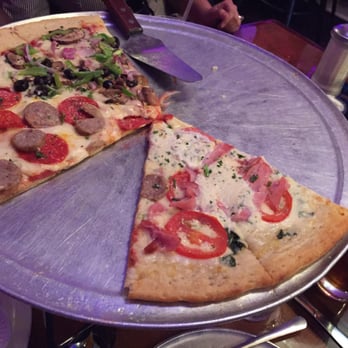 Guillermo's - Four seasons pizza. Thin crust with a mixture of toppings. A bit thin but great taste. - Italian Near Me - San Antonio, Texas Guillermo's - Four seasons pizza. Thin crust with a mixture of toppings. A bit thin but great taste. - Italian Near Me - San Antonio, Texas