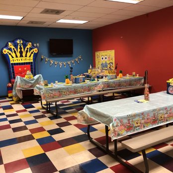 Pump It Up Van Nuys - Two tables pushed together to make one long table for guests.  (1st table for kids and the furthest from B-Day chair the adults sat at) - Kids Activities Near Me - Van Nuys, California