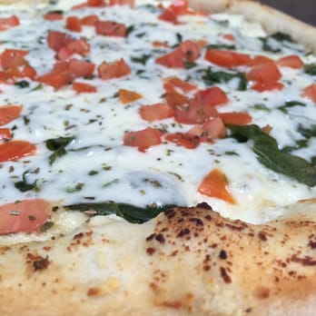 Big Daddy's Pizza - White pizza with Spinach and Tomatoes - Pizza Near Me - Pottstown, Pennsylvania Big Daddy's Pizza - White pizza with Spinach and Tomatoes - Pizza Near Me - Pottstown, Pennsylvania