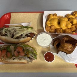 Philly steak dog , LA street dog, onion rings and cheese tater tots. Philly steak dog , LA street dog, onion rings and cheese tater tots.