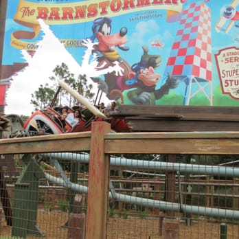 The Barnstormer - Coaster "plowing" through sign - Amusement Parks Near Me - Orlando, Florida The Barnstormer - Coaster "plowing" through sign - Amusement Parks Near Me - Orlando, Florida