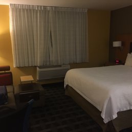 (King suite w/ sofa bed room) Sofa (bed) with nice mini work desk and king size bed. Heater was quick and toasty!