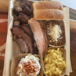 Three meat combo with brisket, smoked pork burnt ends, turkey, and Mac, potato salad, and beans Three meat combo with brisket, smoked pork burnt ends, turkey, and Mac, potato salad, and beans