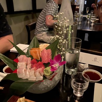 Juno - Chef selection sashimi - see how you can almost see through the sashimi pieces because of how thin they are? - Sushi Bars Near Me - Chicago, Illinois