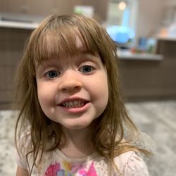Brenner Dental Group - Buffalo - The youngest one so proud of her cleaned teeth