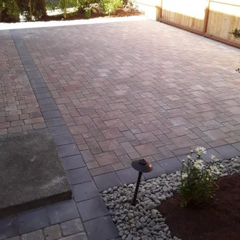 Landscape Creations - a brick paver patio with a gravel border - Masonry/Concrete Near Me